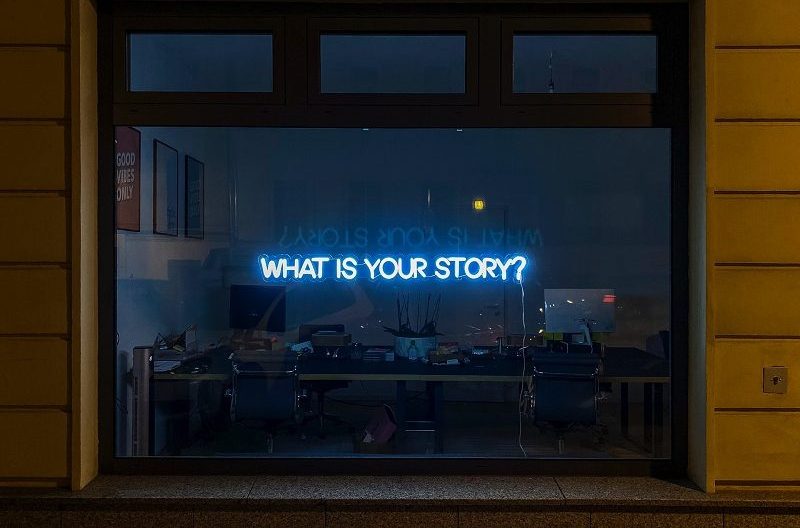 neon sign what is your story coaching articles